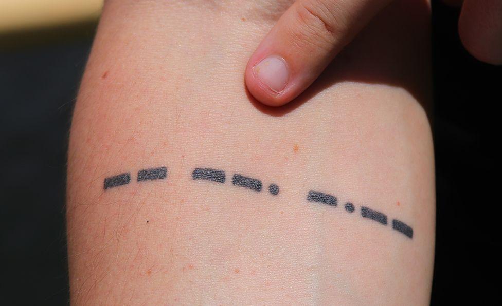 Titanic tattoo: "MGY" in morse code - Titanic's radio call sign