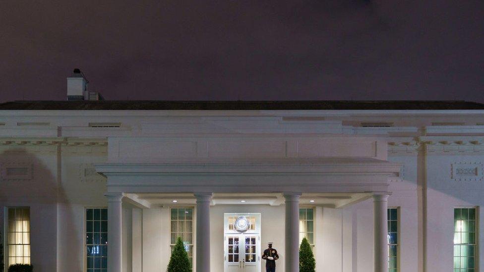 A US Marine guards the White House West Wing on 6 January