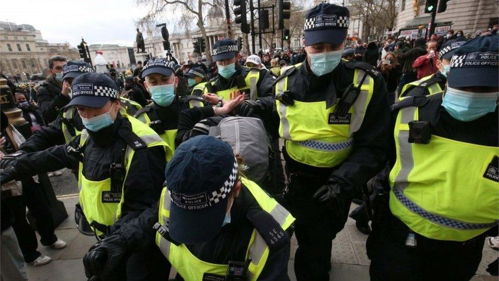 Police arrest a demonstrator at the Kill the Bill protest