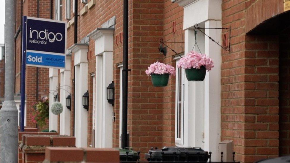 A for sale sign outside a house in Mid Bedfordshire