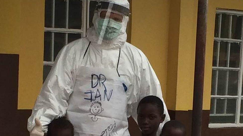 Dr Crozier wearing protective gear