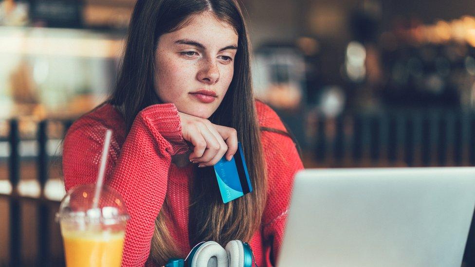 Girl-using-credit-card-online