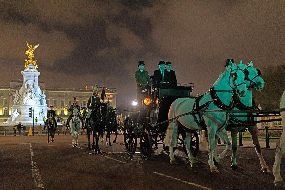 A night time rehearsal for the coronation of King Charles III processes down The Mall on 18 April 2023 in London, England