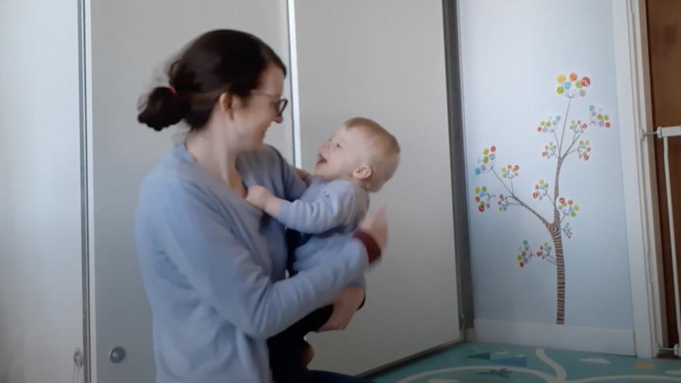 Mum and baby giggling