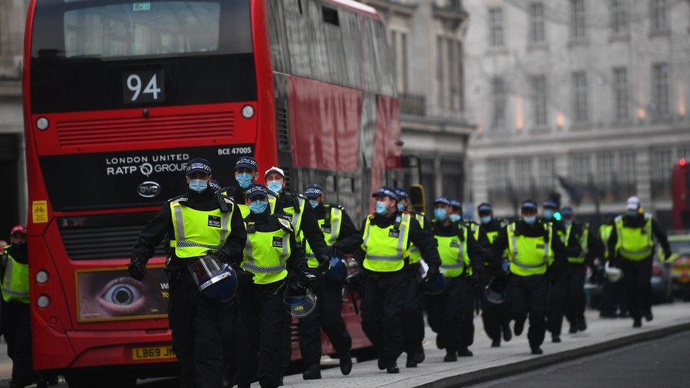 Police at Oxford Circus during an anti-lockdown protest in London over the weekend