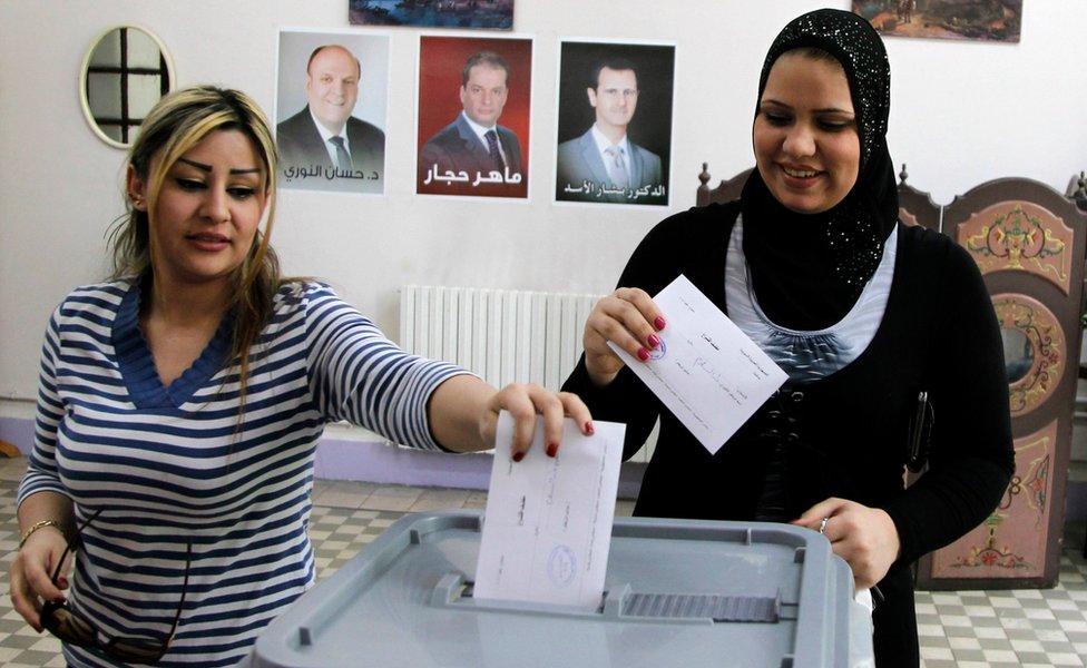 Women from Damascus vote in the June 2014 presidential election in Syria