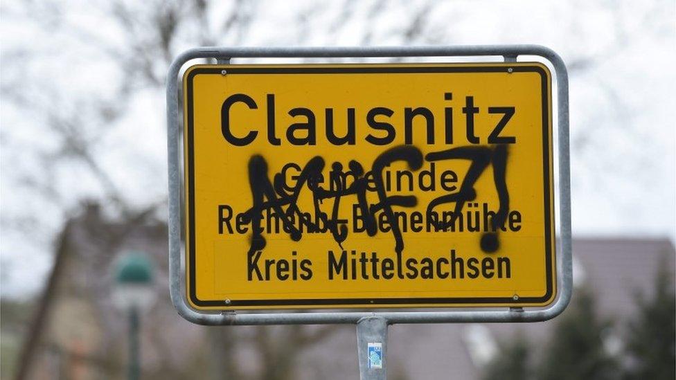 Clausnitz, graffiti covered sign