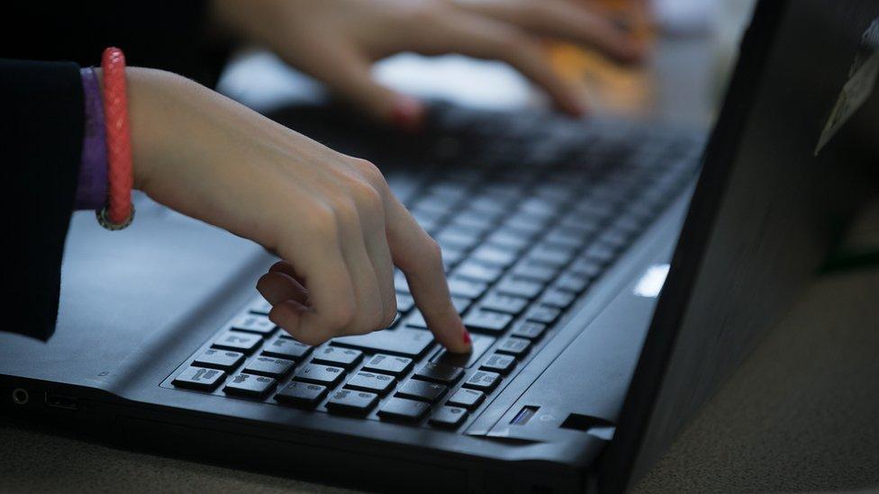 Child with a laptop