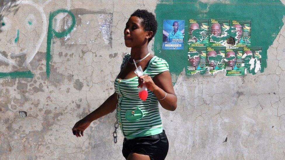 Resident leaves a polling station on 29 December, 2011