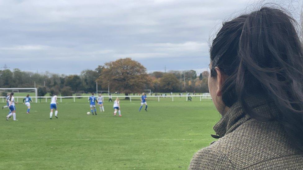 Ms Ruat watching Hertfordshire Girls play football