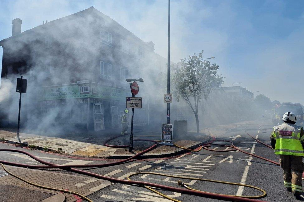 Fire at shop with flats in Eltham