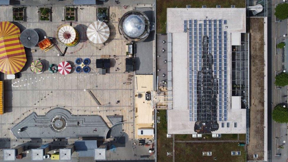 An aerial view of a fire damaged building