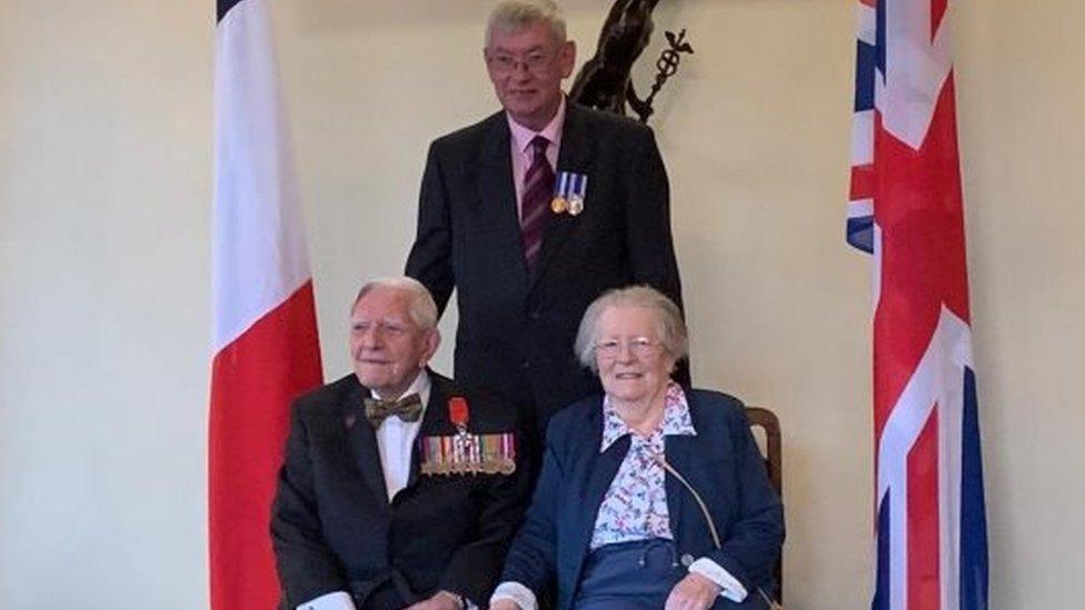 Dennis Roy Cooper with wife Mary and Nick Bates from the Armed Forces charity SSAFA