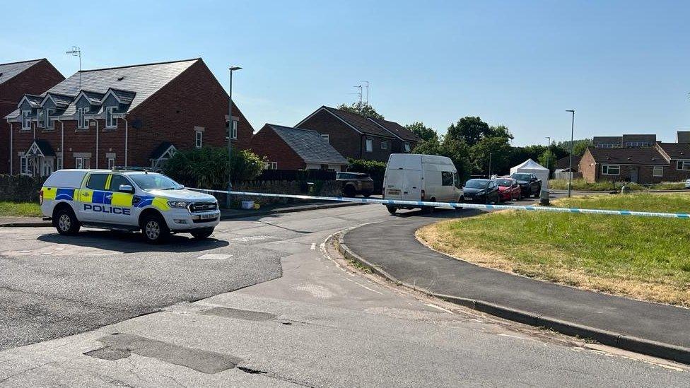 Police cordon and car on Oakfields Road