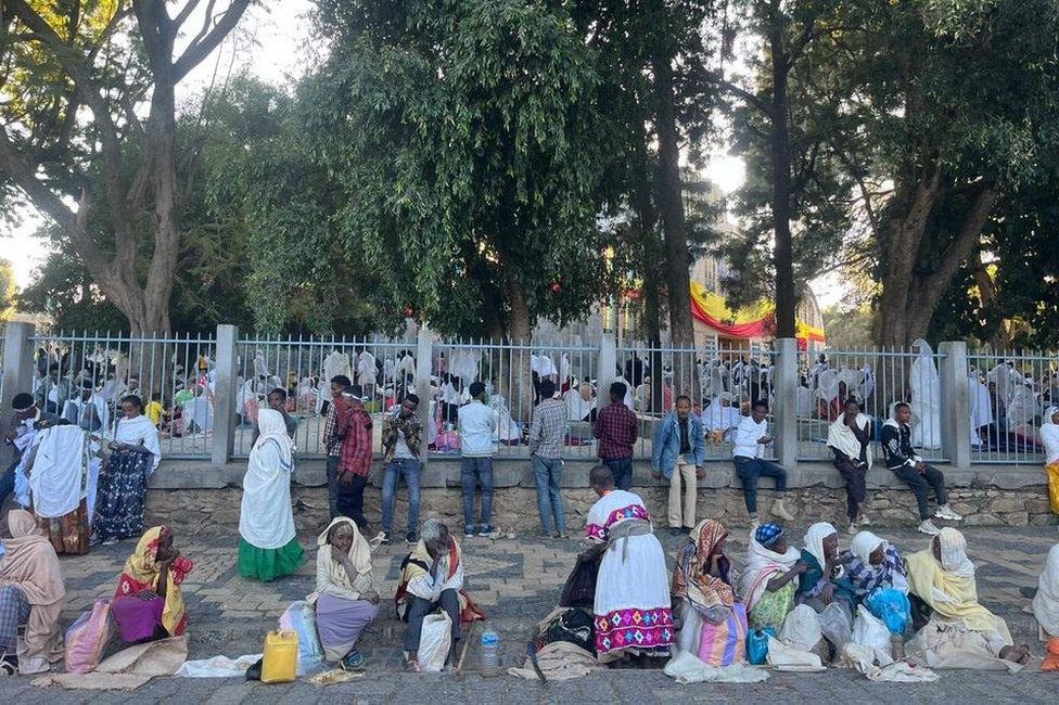 Crowd of people near a church