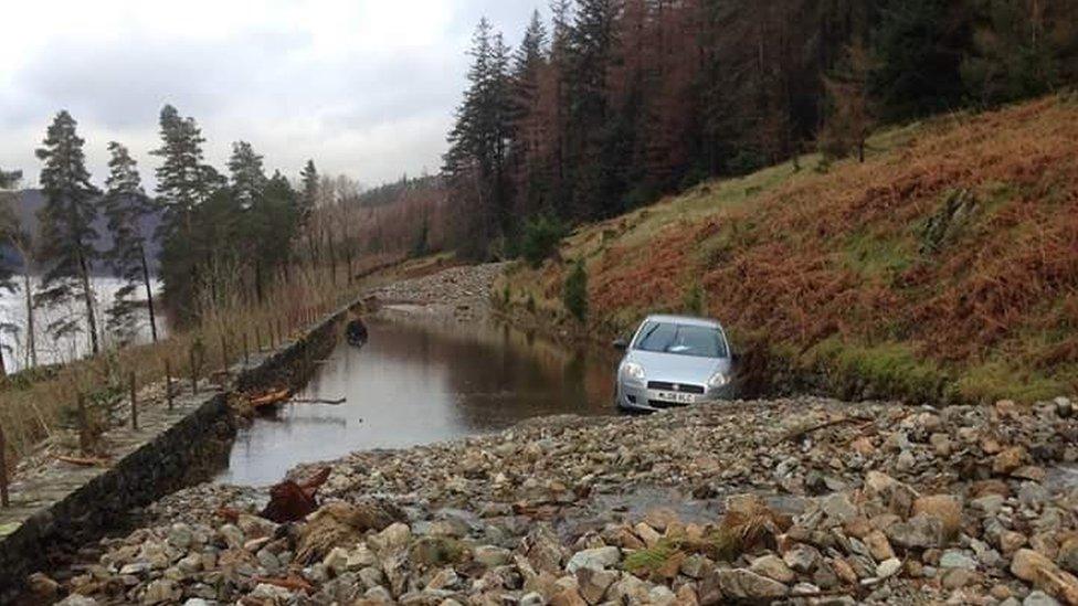 A car was marooned near Thirlmere between two landslides