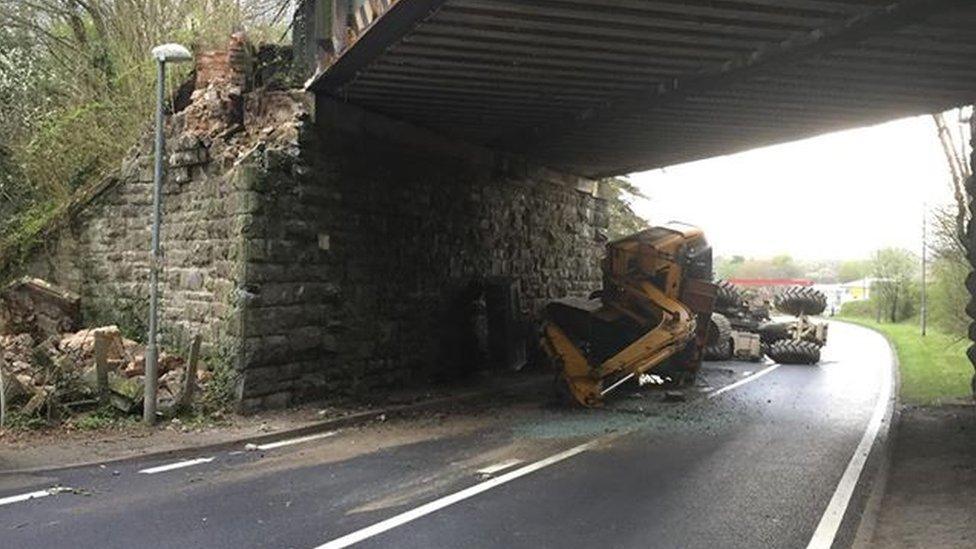 Digger and tractor strike Crossgates bridge in Powys