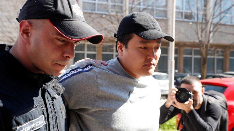 Do Kwon, the cryptocurrency entrepreneur, who created the failed Terra (UST) stablecoin, is taken to court in handcuffs, to face charges of forging official documents, in Podgorica, Montenegro, March 24, 2023.