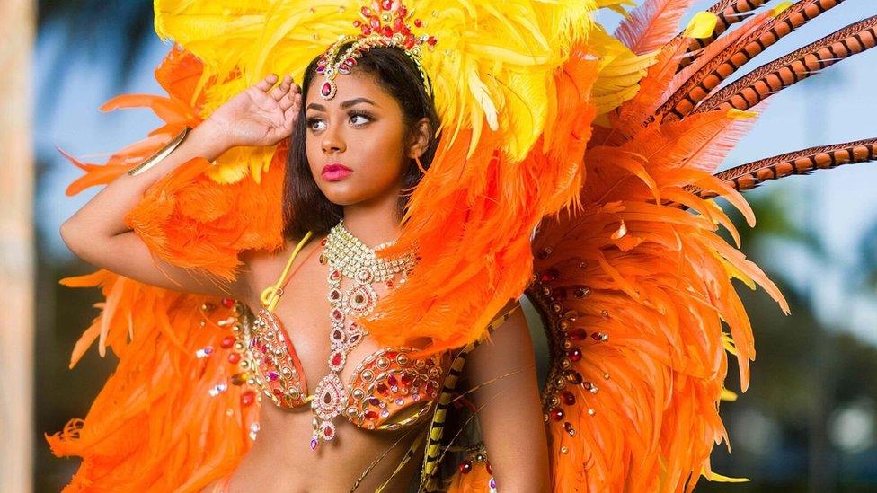 A woman models a costume made by Insane Troupe