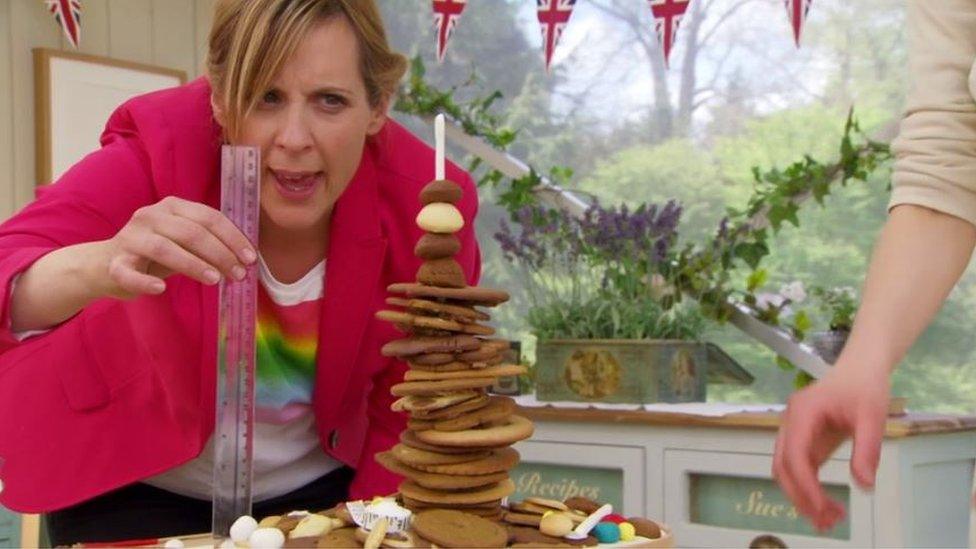 Mel Giedroyc with the tower of biscuits