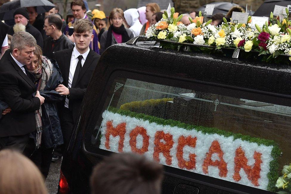 A hearse carrying the coffin of Morgan Barnard