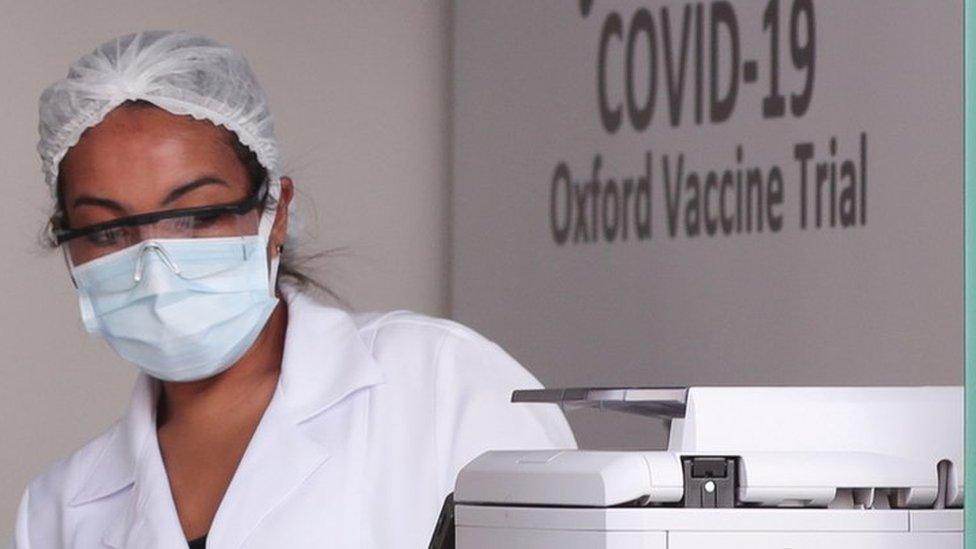 An employee is seen at the Federal University of Sao Paulo (Unifesp) where the trials of the Oxford/AstraZeneca coronavirus vaccine are being conducted