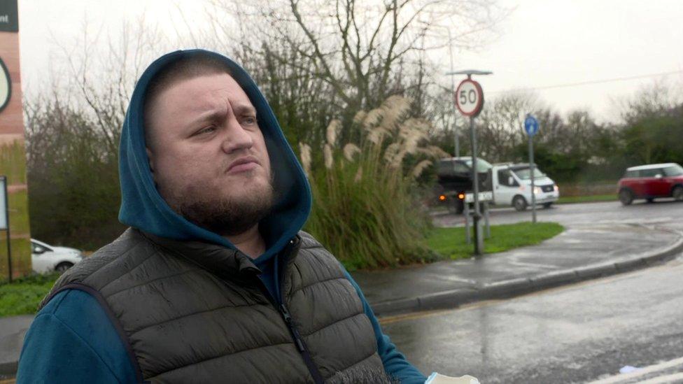 A lorry driver talking to the BBC