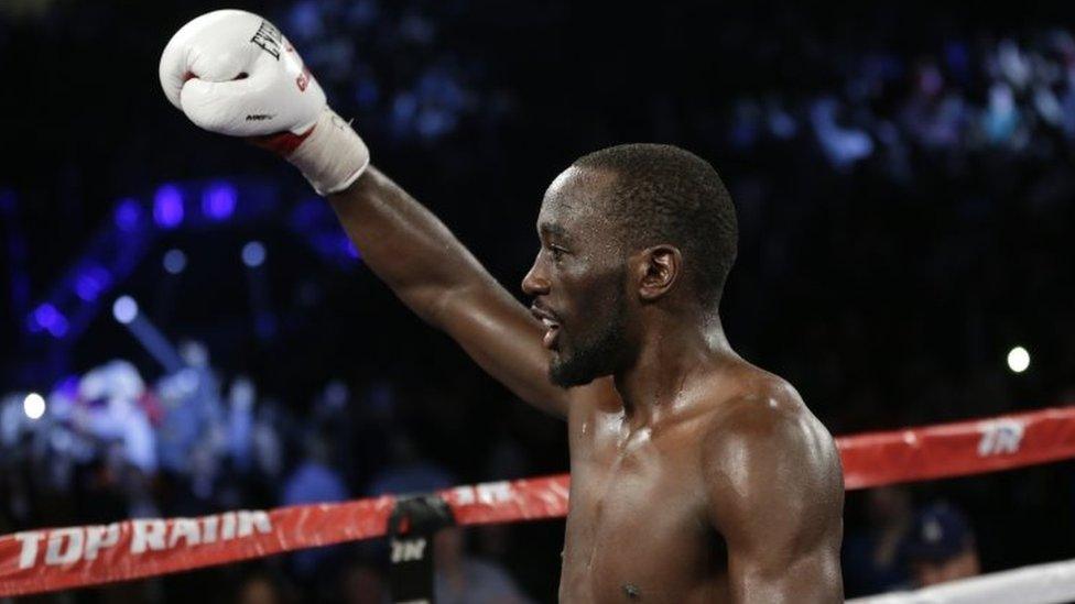 Crawford celebrates after defeating Molina in Omaha on 10 December