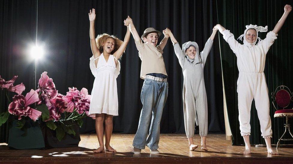 Actors at curtain call