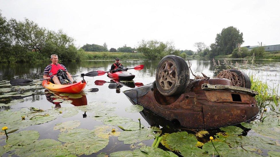 POOTS IN CANOE