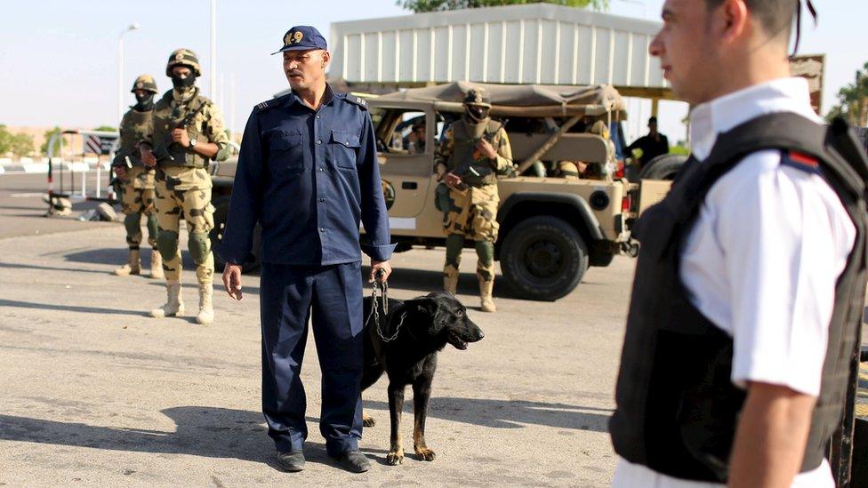 Police inspects cars entering the airport of the Red Sea resort of Sharm el-Sheikh, November 7, 2015.