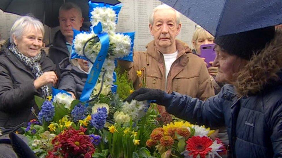 Sheena Low, sister of Gaul skipper Peter Nellist, lays a wreath in Hessle Road, Hull