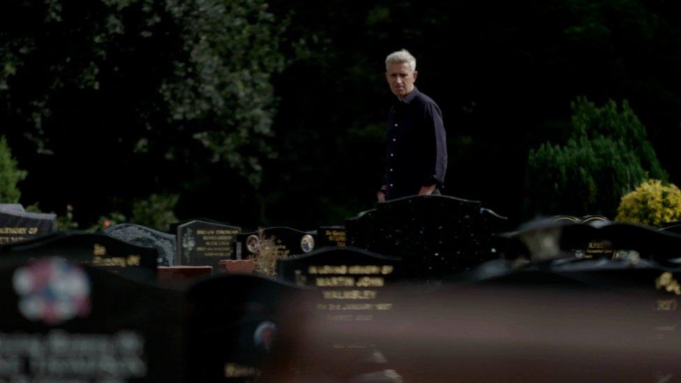 Reporter Richard Bilton walking through a graveyard in Stockton.