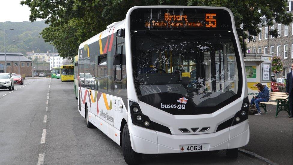 Bus at stop.