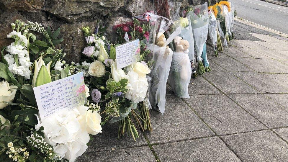 Floral and soft toy tributes were left on Wolesley Road, near Biddick Drive