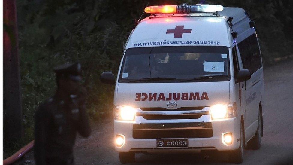 An ambulance exits from the Tham Luang cave area as rescue operations continue for those still trapped inside the cave in Khun Nam Nang Non Forest Park in the Mae Sai district of Chiang Rai province on July 9, 2018