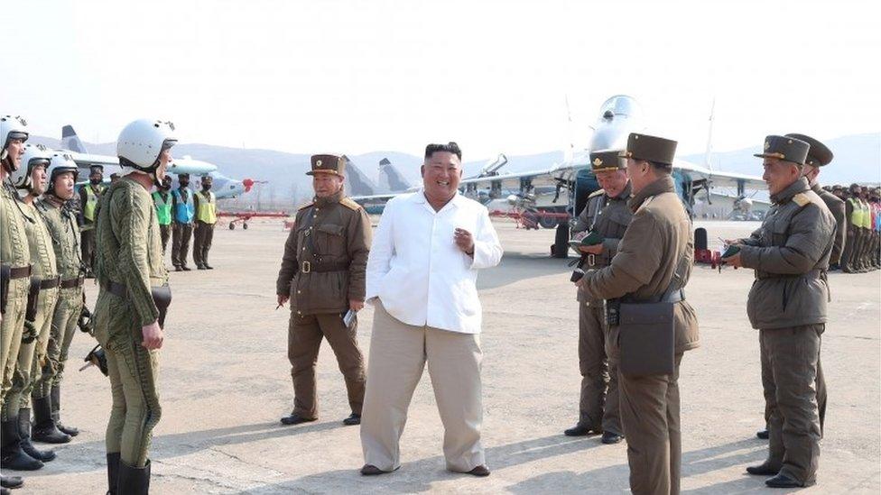 North Korean leader Kim Jong Un gives field guidance during his visit to a pursuit assault plane group under the Air and Anti-Aircraft Division in the western area in this undated image released by North Korea"s Korean Central News Agency (KCNA) in Pyongyang on April 12, 2020.