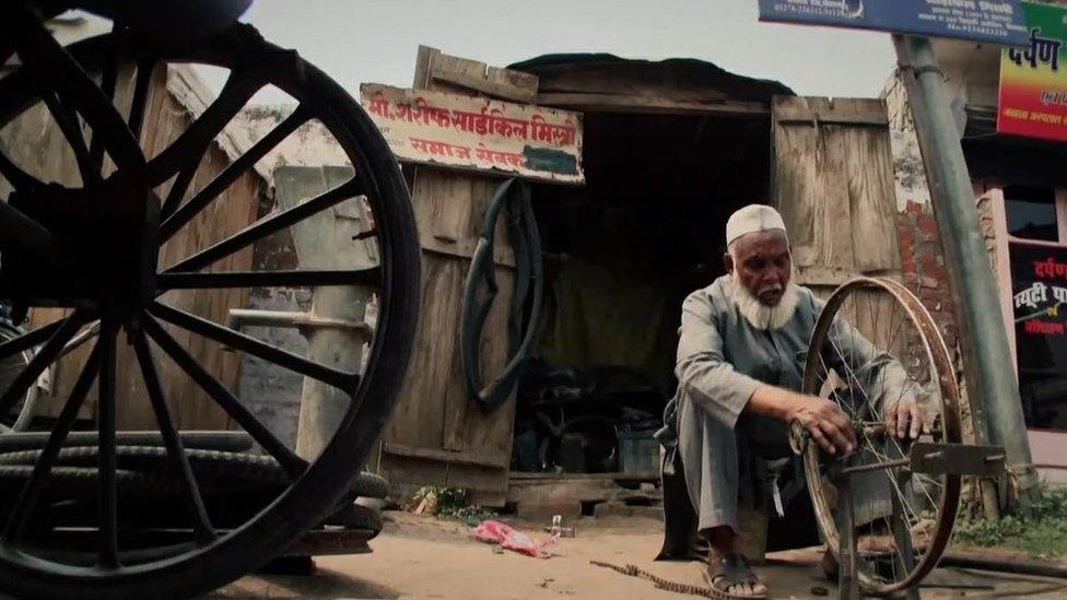 Mohammad Shareef repairing a cycle wheel