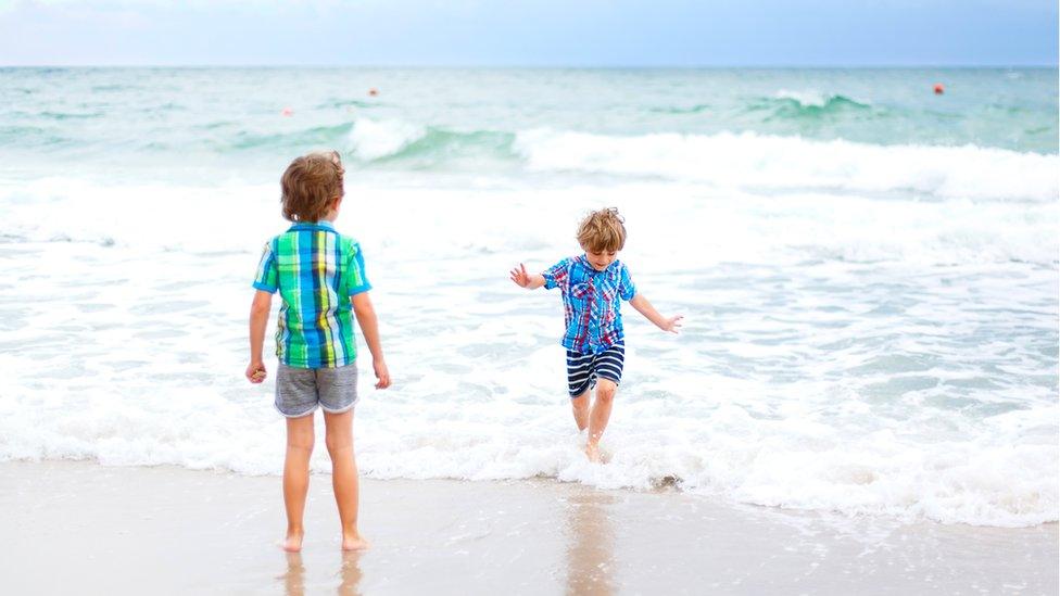 children in sea