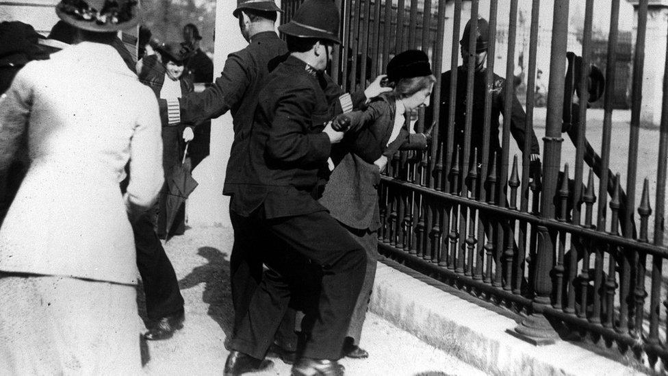 Suffragette being arrested