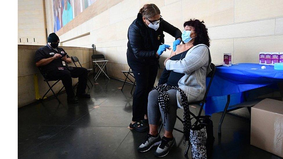 A woman receiving a Covid-19 vaccine in Los Angeles earlier in January.