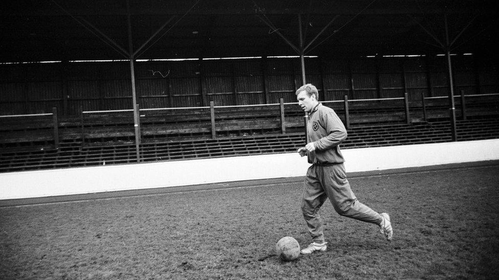 Bobby Moore, England captain, trains on his home ground, in January 1965