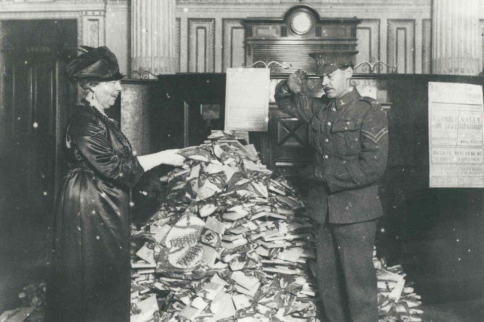 Lady Florence Boot presenting a gift to a wounded soldier