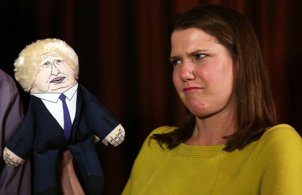 Jo Swinson with a puppet of Prime Minister Boris Johnson