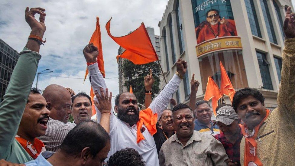 Shive Sena supporters burn the effigy of rebel Shiv Sena MLA Sada Sarvankar during a bike rally outside Shiv Sena Bhavan, Shivaji Park, Dadar, on June 26, 2022 in Mumbai, India.