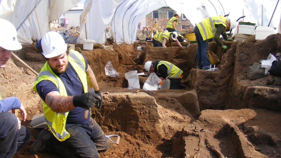 archaeologists at work