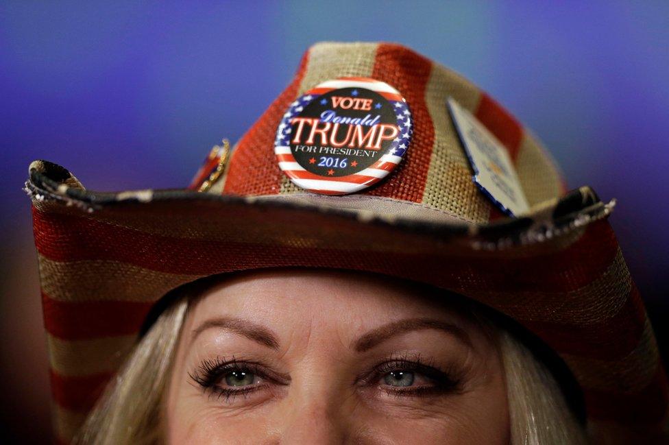 Donna Deer, a supporter of Republican presidential candidate Donald Trump, waits to be interviewed during an election night rally in Indianapolis