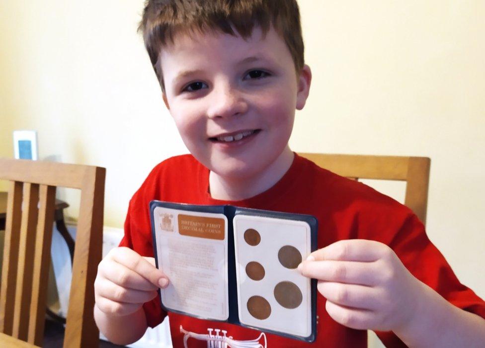 Michael and some of his coins