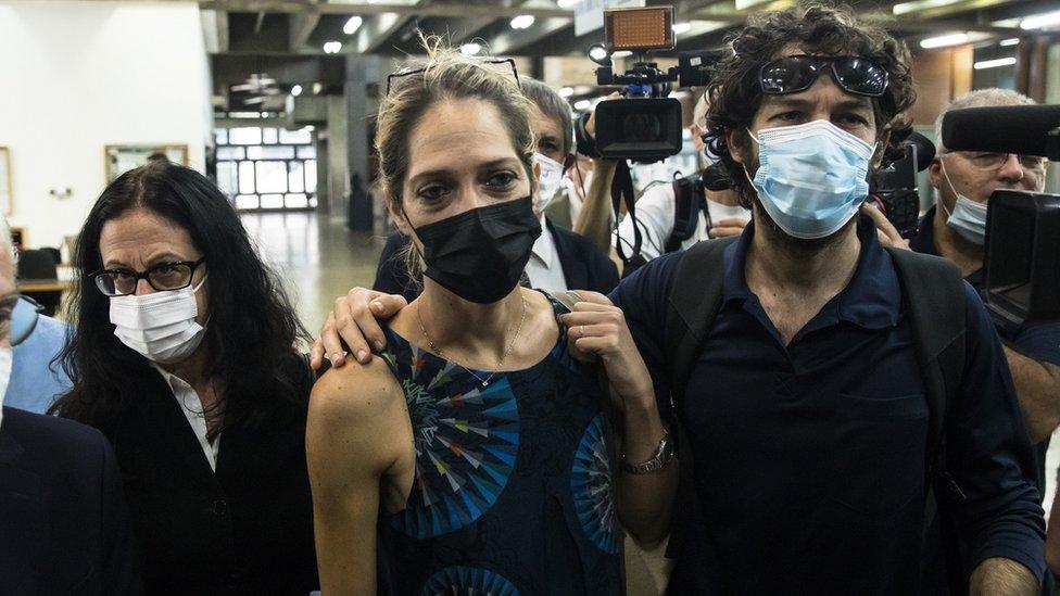 Aya Biran Nirko (C), a paternal aunt of Eitan Biran, arrives to court for a hearing on the alleged kidnapping of her nephew by his maternal grandfather Shmuel Peleg on October 8, 2021 in Tel Aviv, Israel.