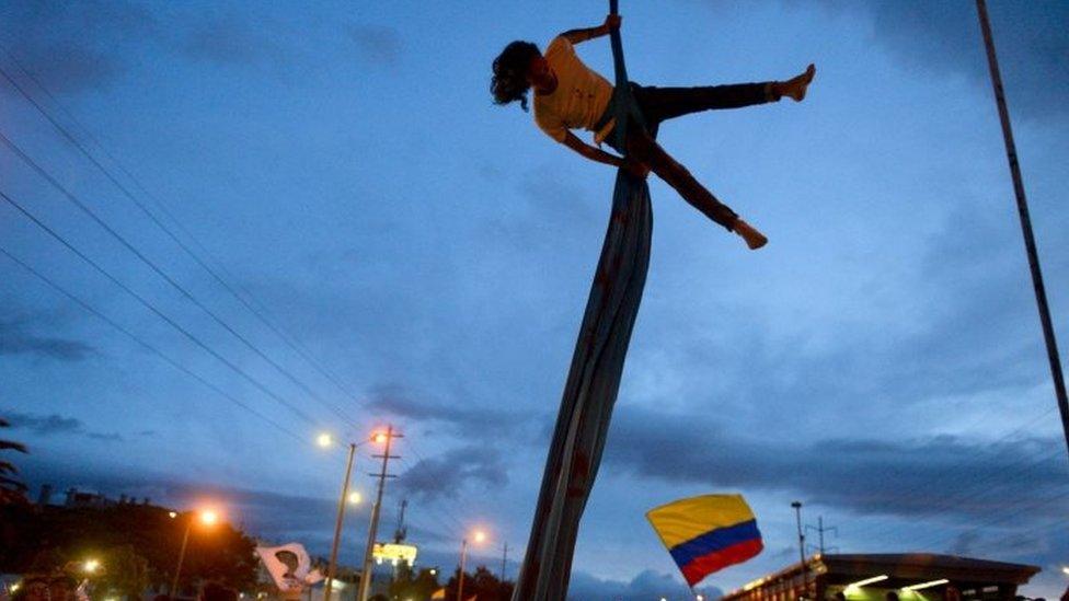 An artist performs during a protest against the government of Colombian President Ivan Duque in Bogota on 27 November, 2019